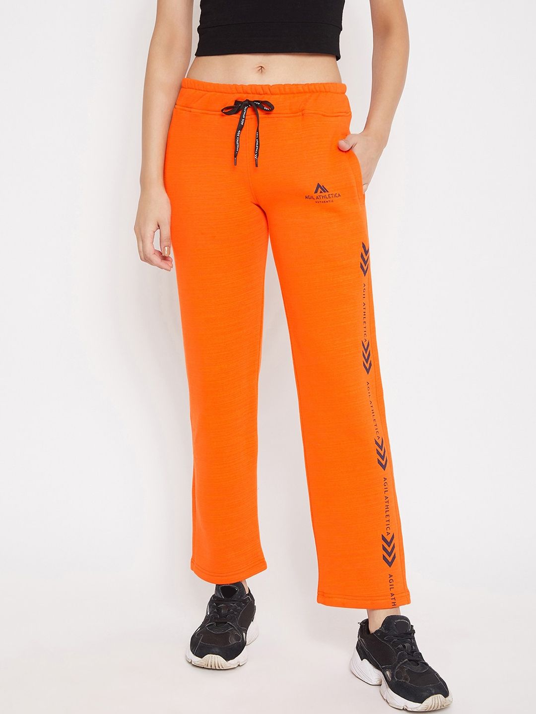 AGIL ATHLETICA Women Orange Solid Motion Lite Track Pants Price in India