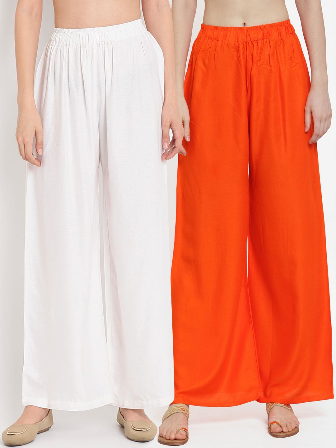 TAG 7 Women Orange & White Solid Flared Palazzos Price in India