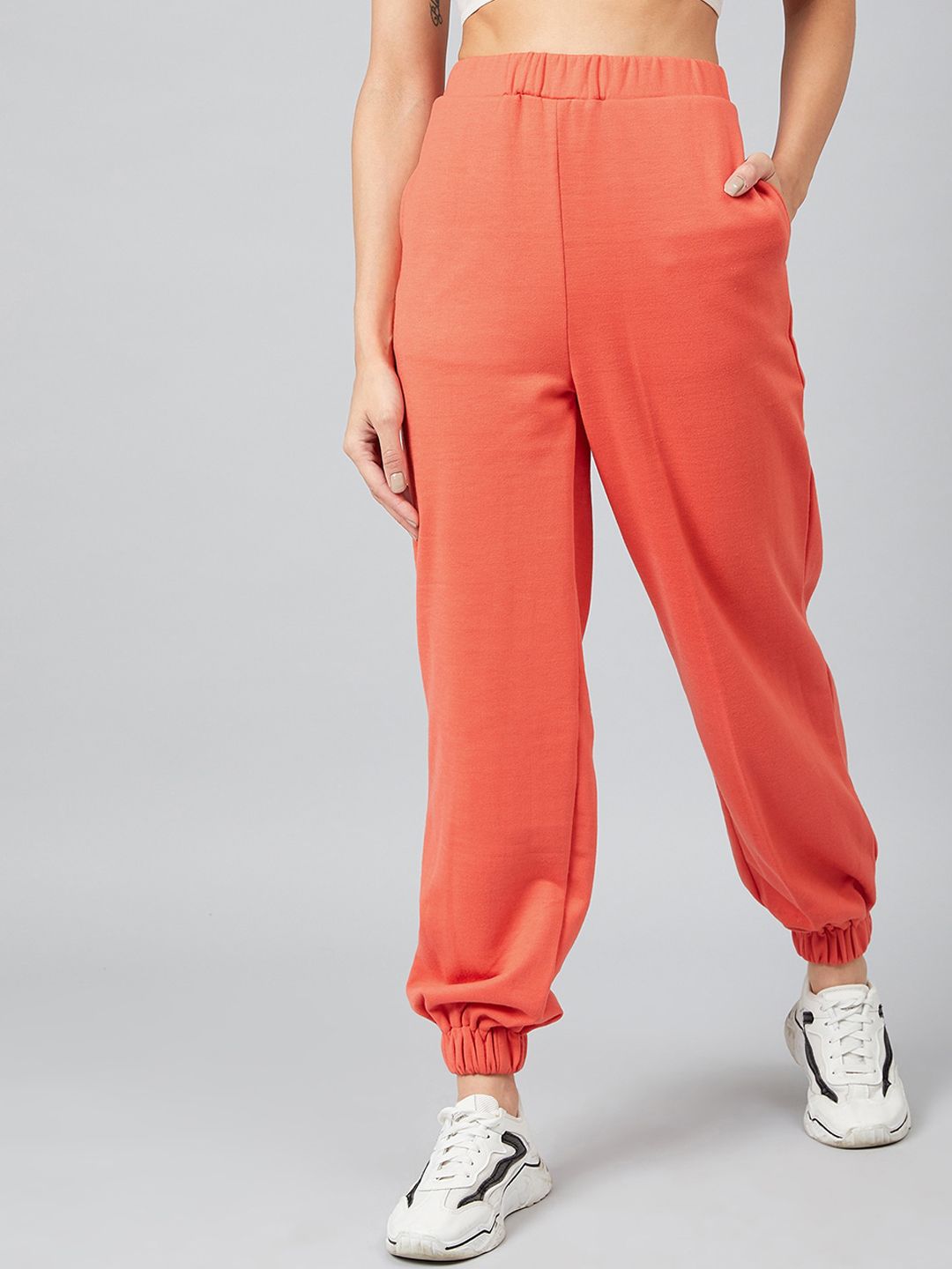Athena Women Orange Relaxed Loose Fit Solid Joggers Price in India