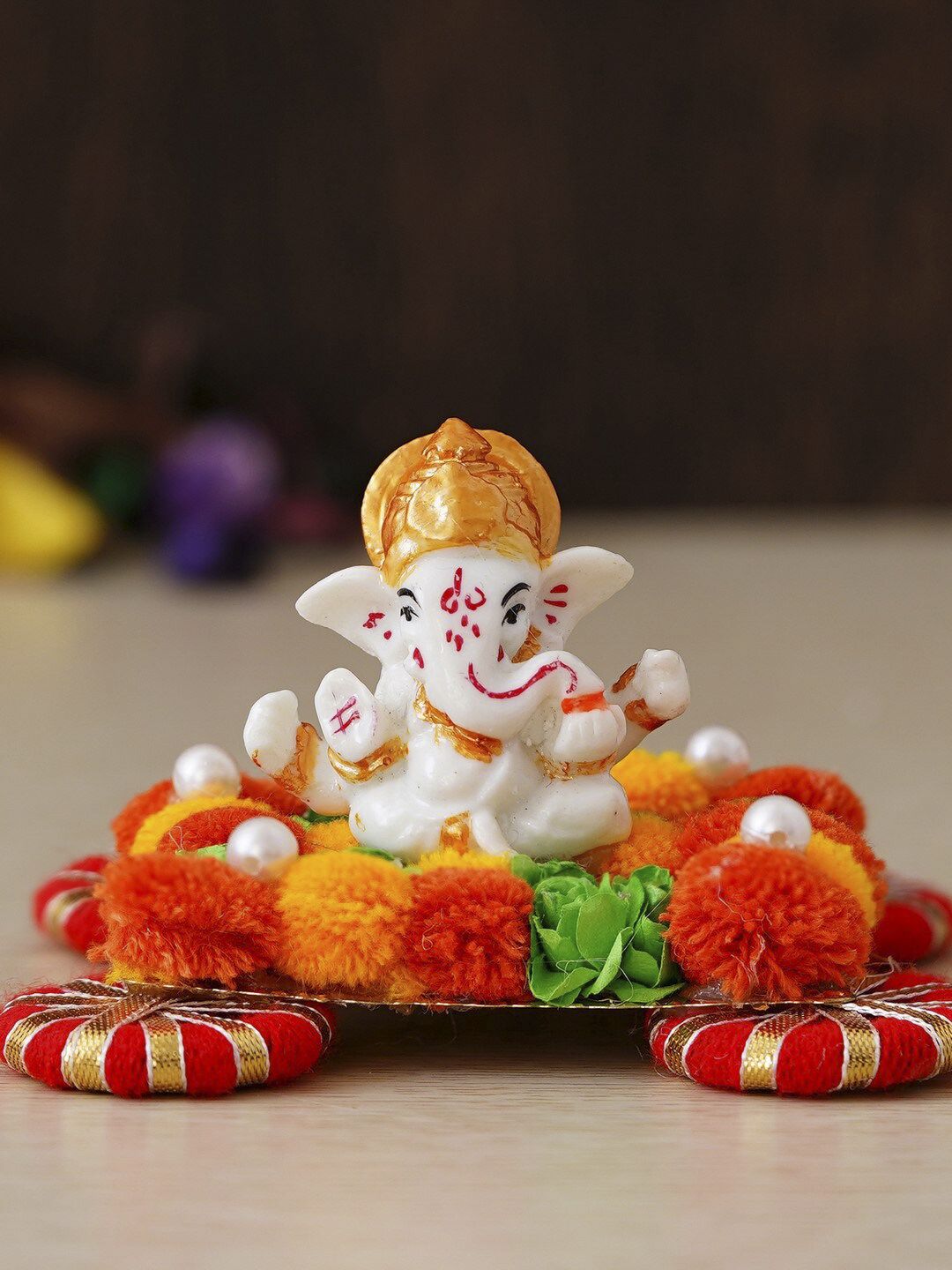 eCraftIndia Orange & White Handcrafted Lord Ganesha Idol With Floral Plate Showpiece Price in India