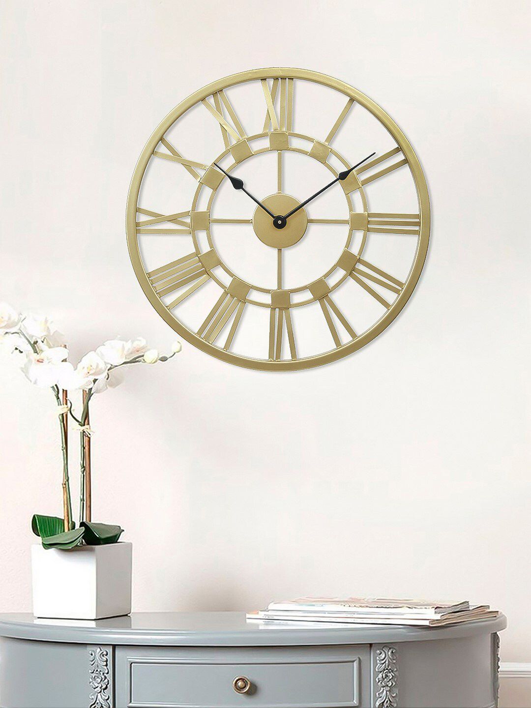 eCraftIndia Gold-Toned Handcrafted Round Solid Analogue Wall Clock Price in India