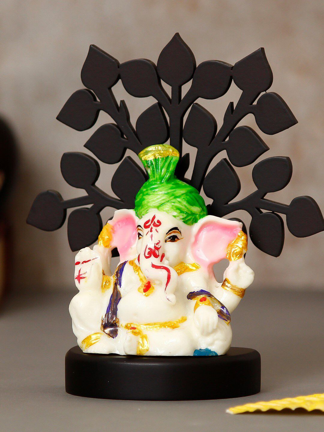 eCraftIndia Black & White Textured Decorative Lord Ganesha Idol With Wooden Tree Price in India