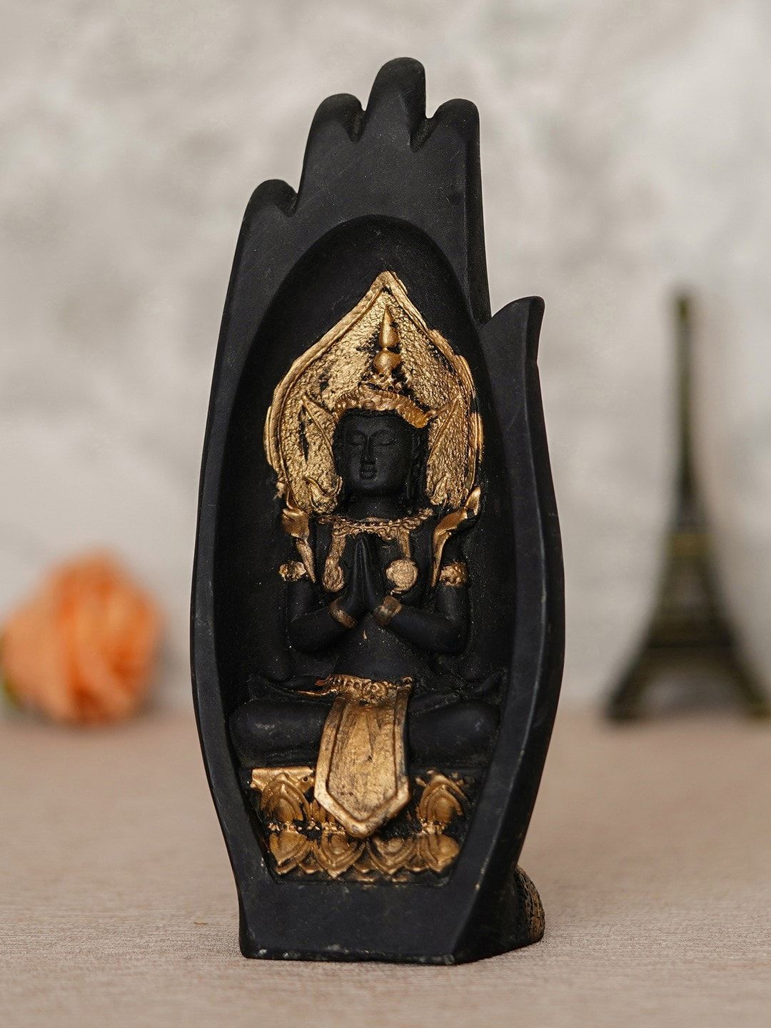 eCraftIndia Gold-Toned & Black Handcrafted Engraved Palm Buddha Decorative Showpiece Price in India