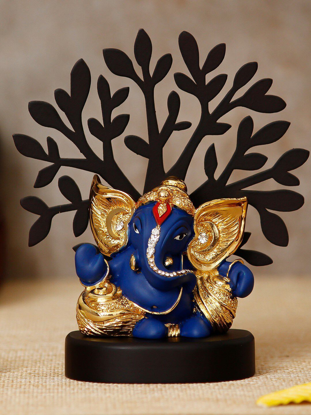 eCraftIndia Gold Plated Blue & Black Lord Ganesha With Wooden Tree Showpiece Price in India