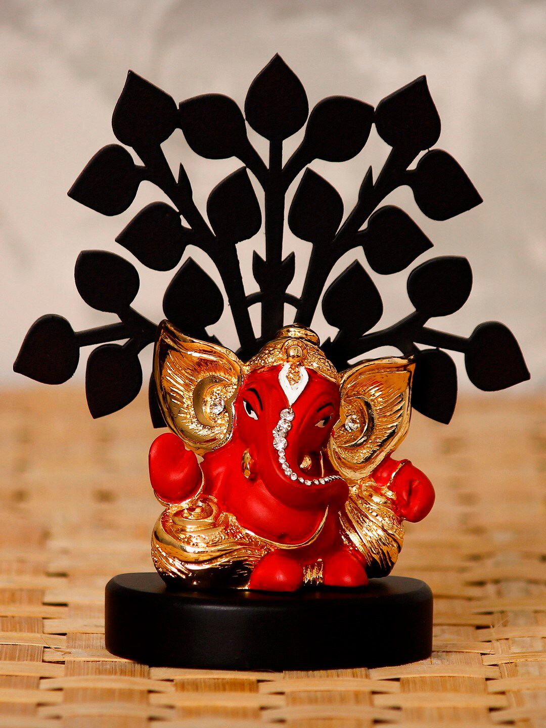 eCraftIndia Gold-Plated Red & Black Kaan Ganesha With Wooden Tree Showpiece Price in India