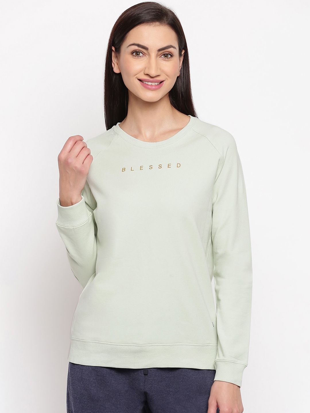 Enamor Women Green Solid Relaxed Fit Basic Sweat Shirt Price in India