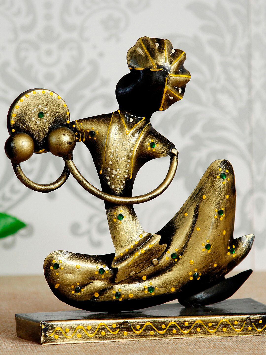 eCraftIndia Gold-Toned & Black Tribal Man With Pagdhi Playing Musical Instrument Decorative Showpiece Price in India