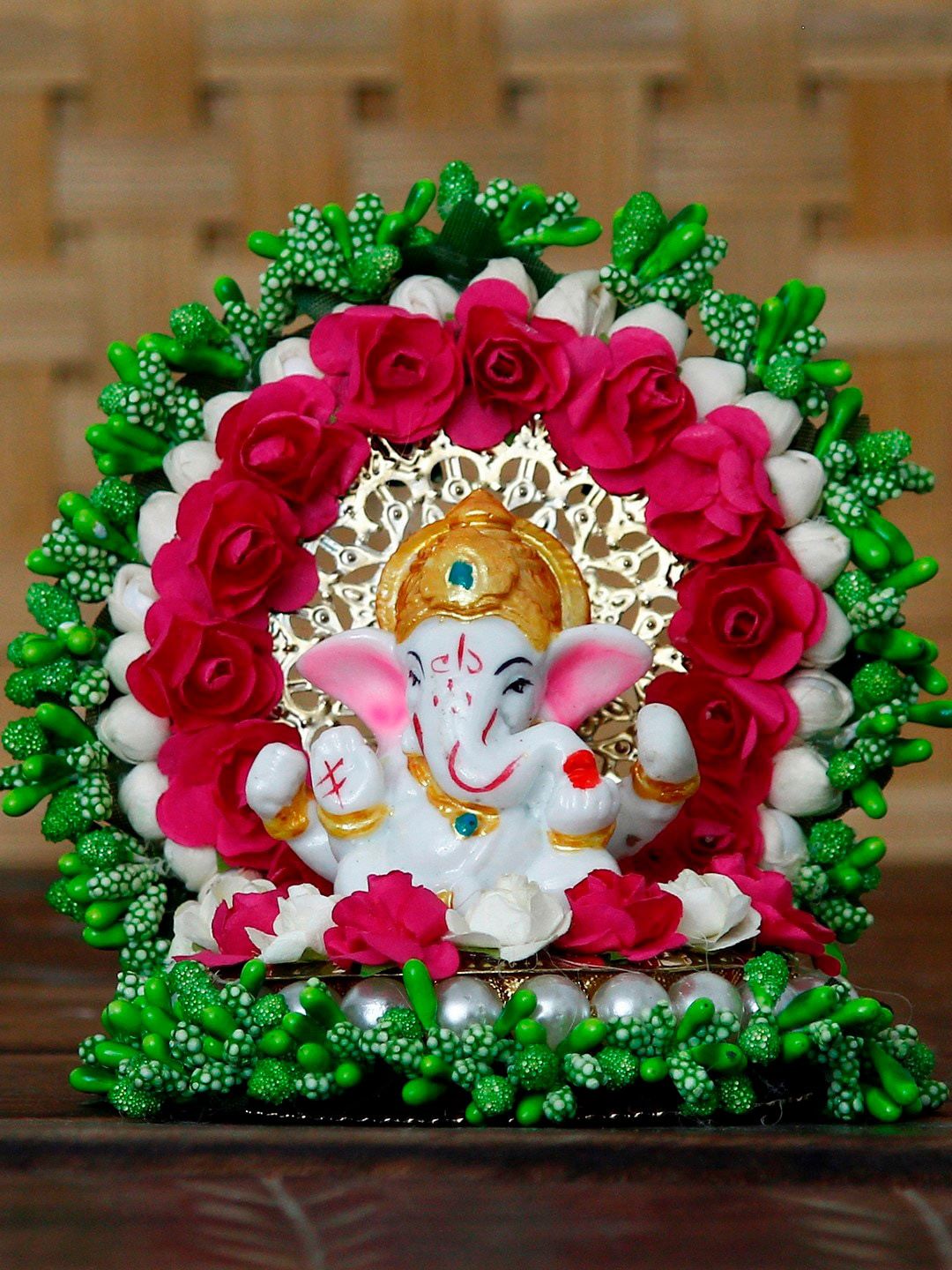 eCraftIndia Green & Pink Handcrafted Ganesha Idol Showpiece Price in India