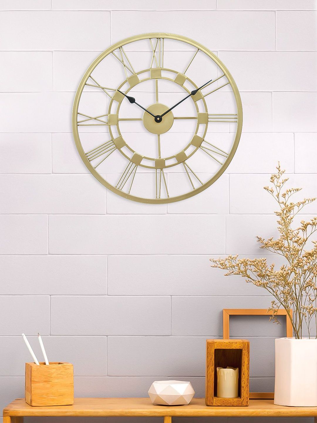 eCraftIndia Gold-Toned Handcrafted Round Solid Analogue Wall Clock Price in India