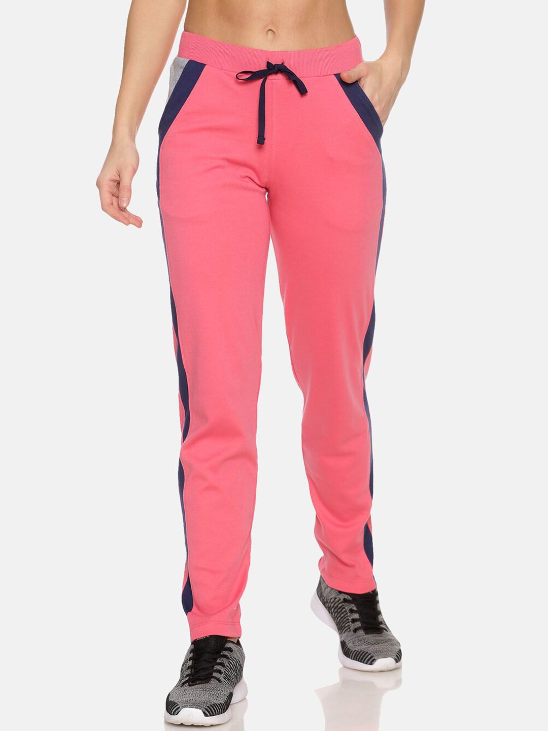 FEMEA Women Coral Pink Solid Track Pants Price in India