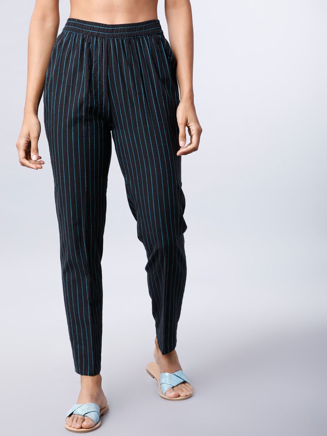 Vishudh Women Black Slim Fit Striped Regular Trousers Price in India