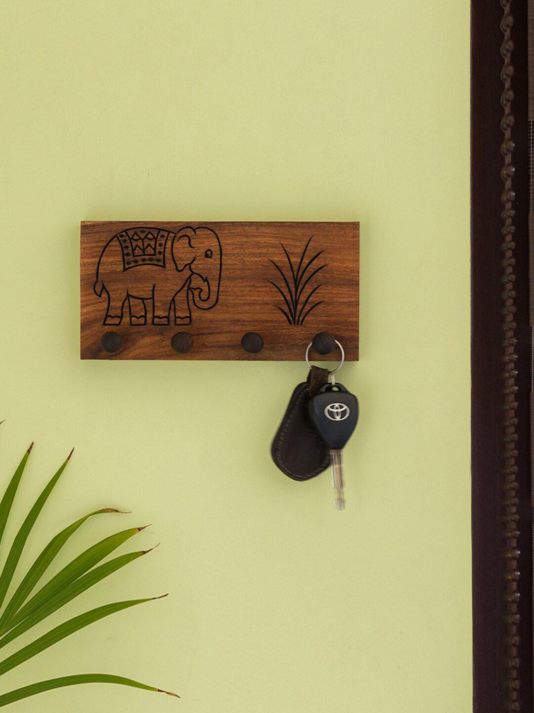 ExclusiveLane Brown Elephant Encarved Handcrafted Sheesham Wooden Key Holder Price in India
