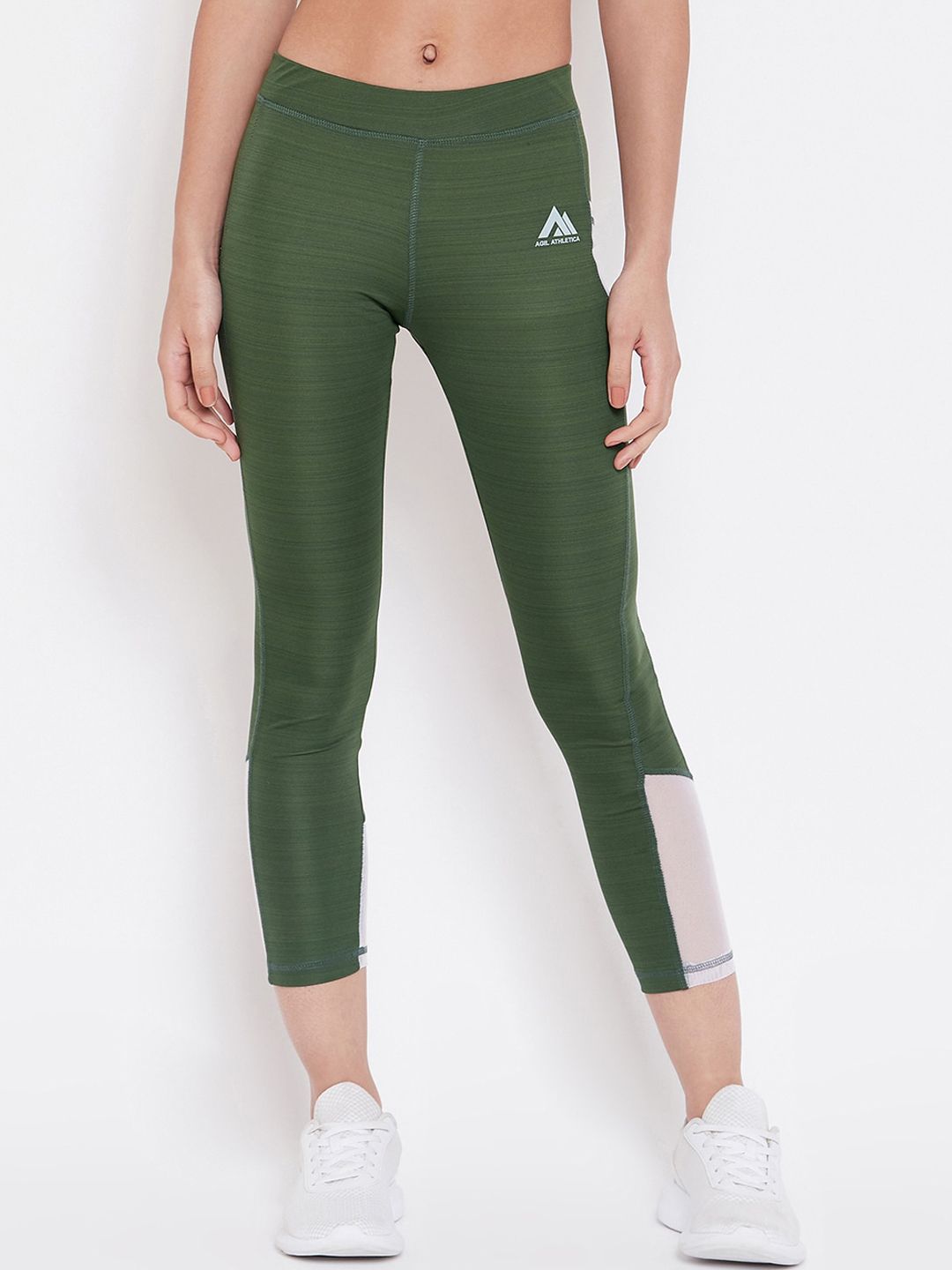 AGIL ATHLETICA Women Green Solid Rapid Dry Technology Tights Price in India