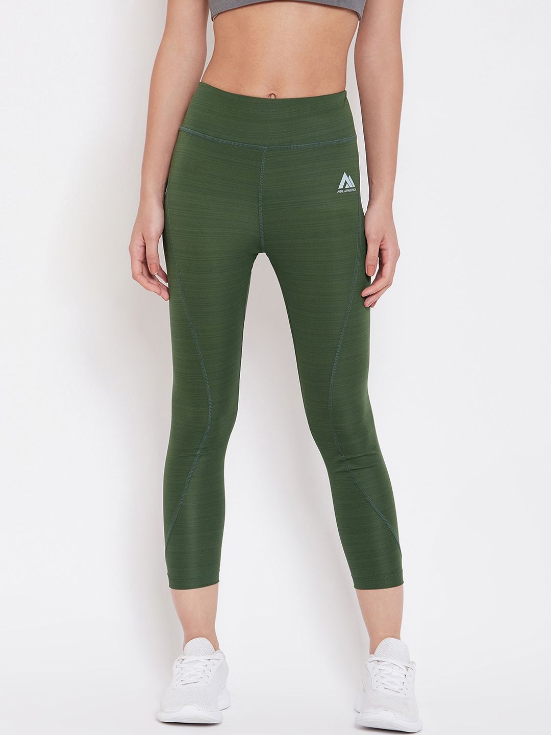 AGIL ATHLETICA Women Green Solid Rapid Dry Tights Price in India