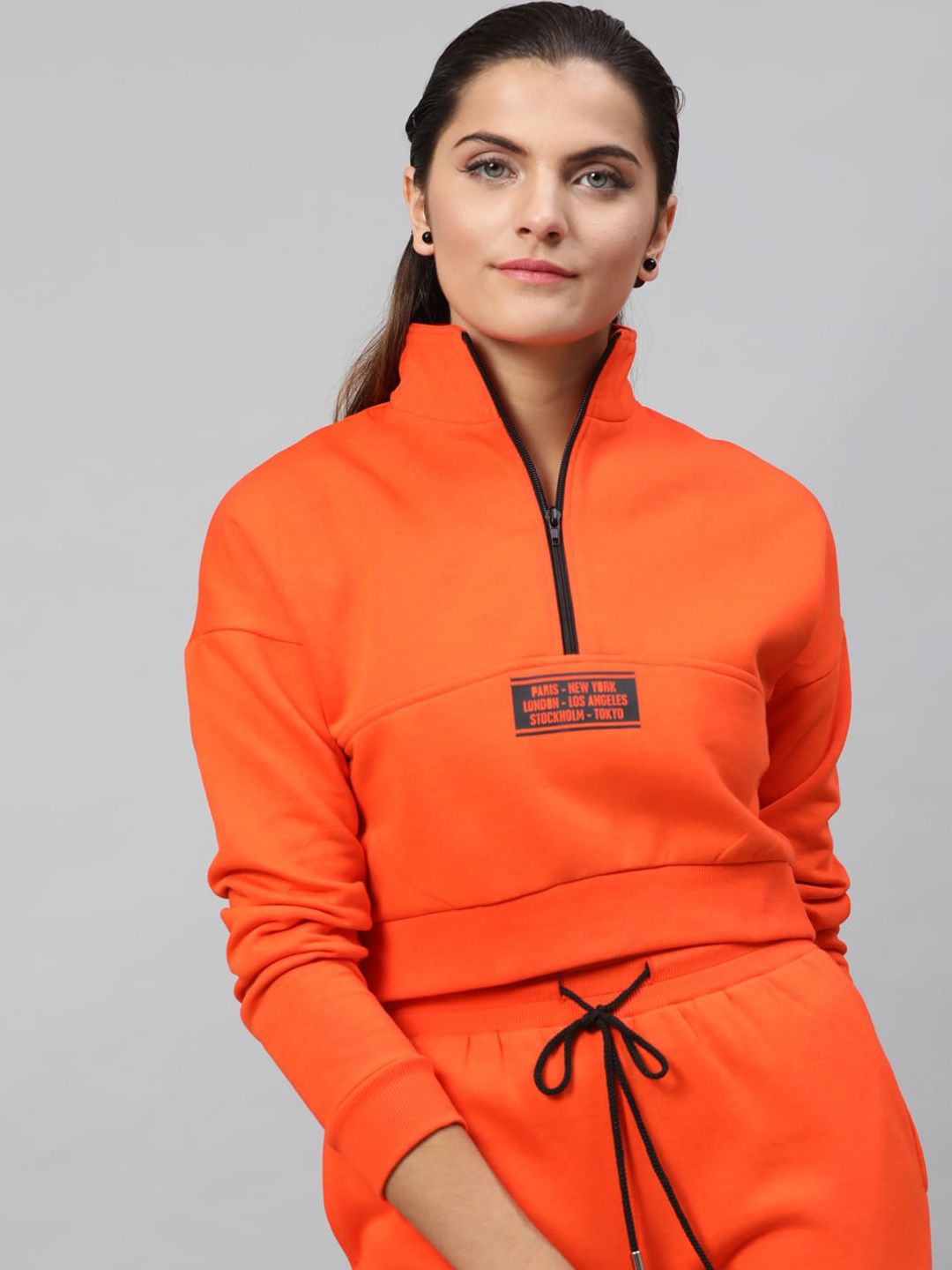 STREET 9 Women Orange Solid Sweatshirt Price in India