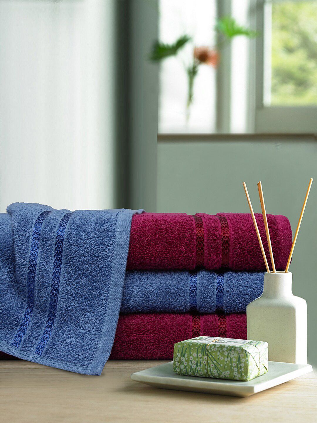 CORE Designed by SPACES Pack Of 4 Blue & Maroon Solid Quik Dry 380 GSM Bath Towels Price in India