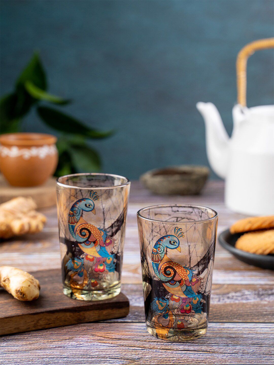 KOLOROBIA Beige & Blue Set of 2 Charismatic Peacock Printed Chai Glasses Price in India