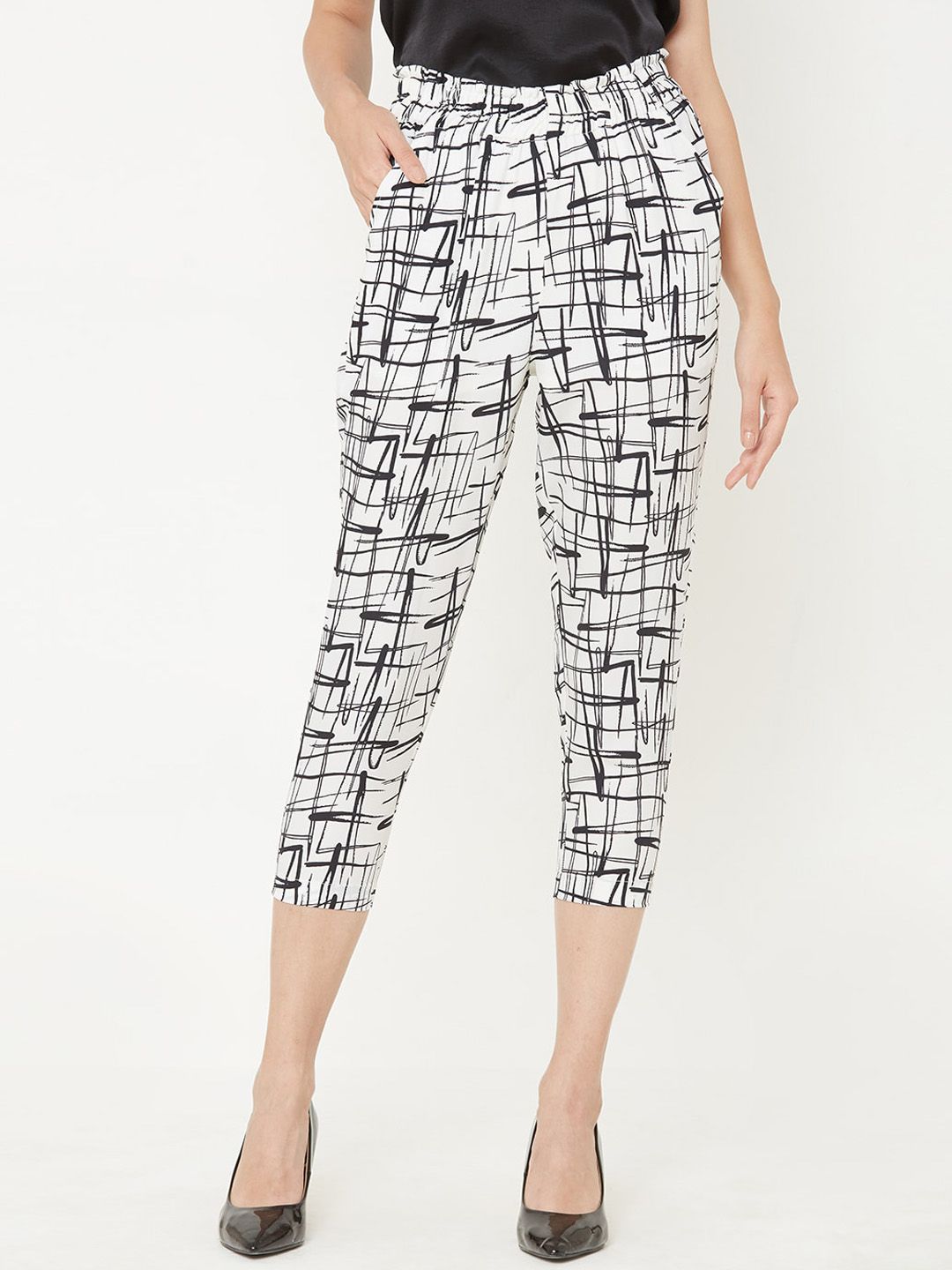 MISH Women Off-White & Black Comfort Regular Fit Printed Regular Trousers Price in India