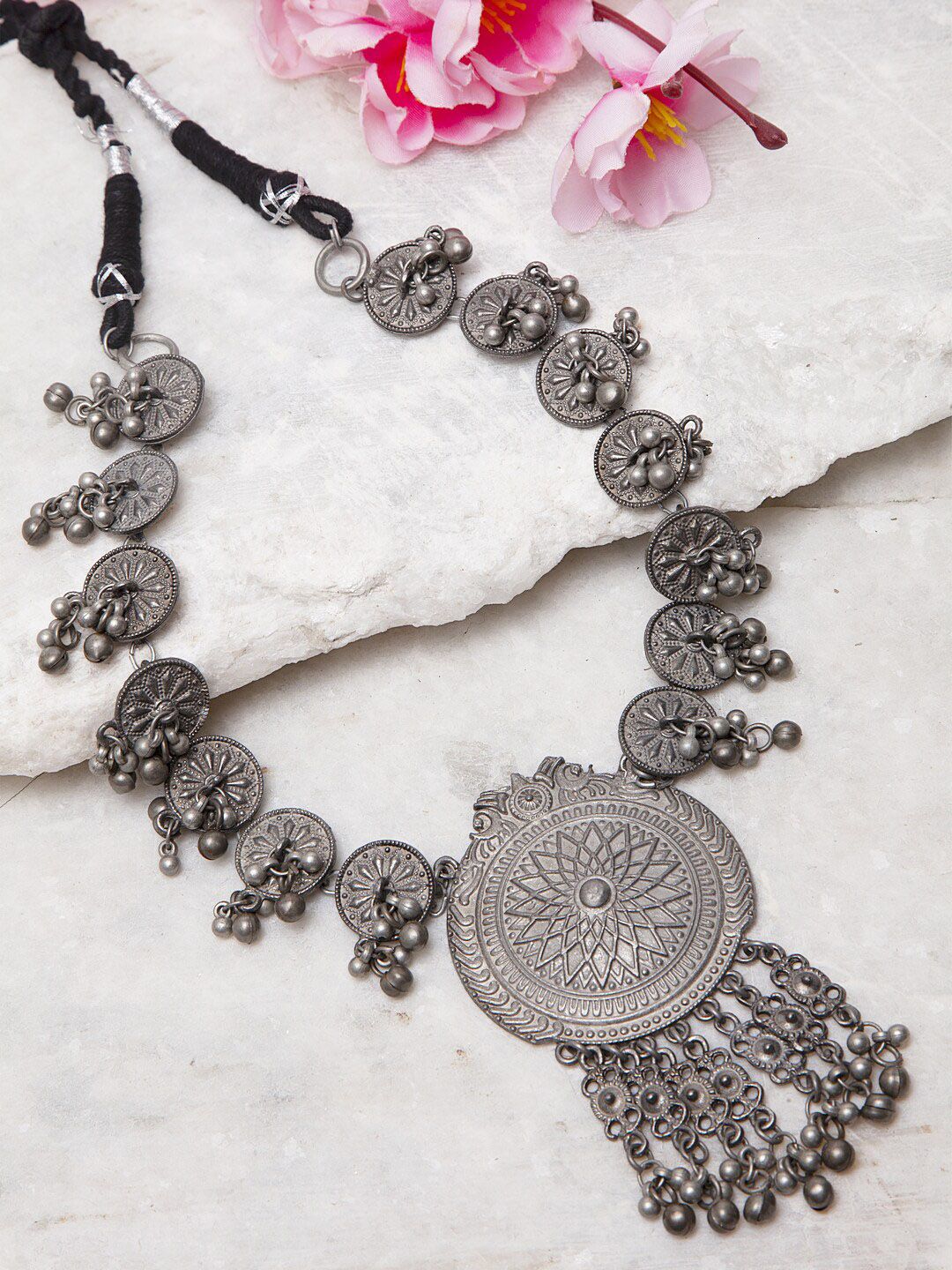 Moedbuille Silver-Toned Ghungroo Studded Tasselled Tribal Look Antique Oxidised Necklace Price in India