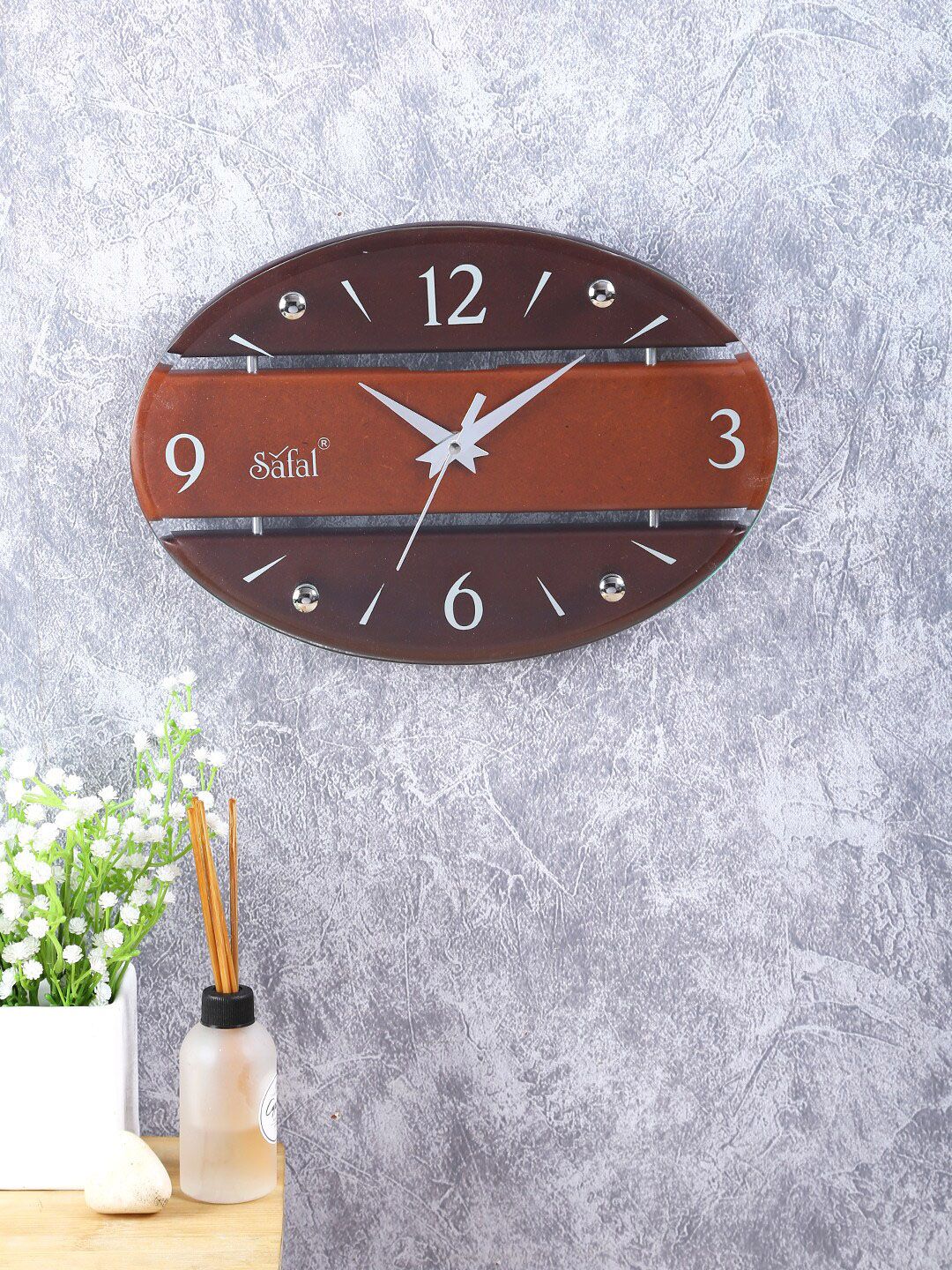 Safal Brown Analogue Oval Shaped Wall Clock Price in India