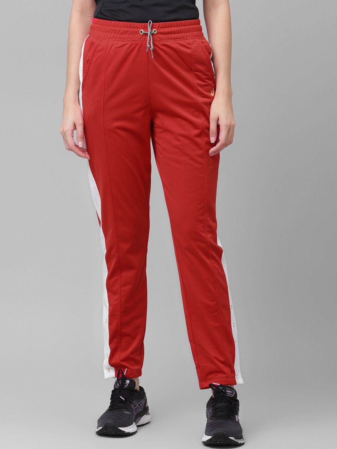 ASICS Women Red Solid Slim Fit W TOKYO WARM UP JOGGER WO Track Pants Price in India