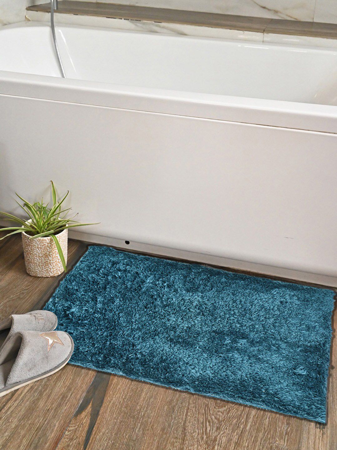 AVI Living Teal Coloured Solid Quick Dry Anti Slip 1200 GSM Bath Rug Price in India
