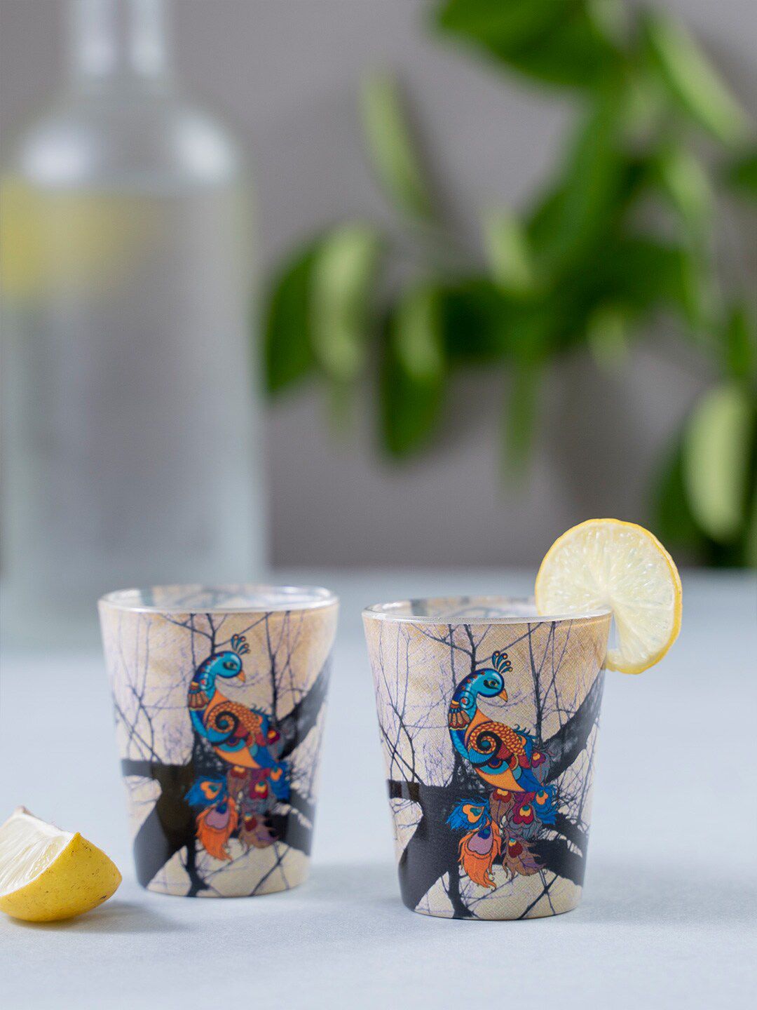 KOLOROBIA Set Of 2 Off-White & Blue Charismatic Peacock Shot Glasses 30 ml Price in India