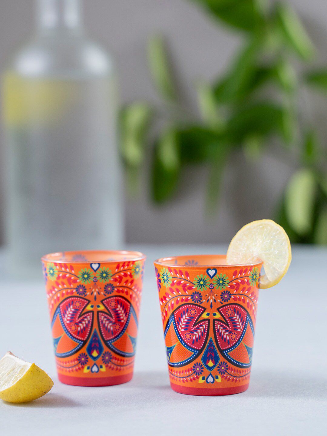 KOLOROBIA Set of 2 Orange & Blue Printed Truck Art Fishes Shot Glasses Price in India