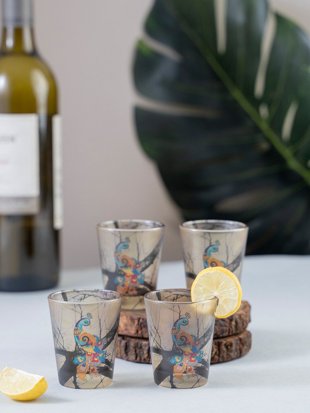 KOLOROBIA Set Of 4 Transparent & Blue Charismatic Peacock Frosted Shot Glass Price in India