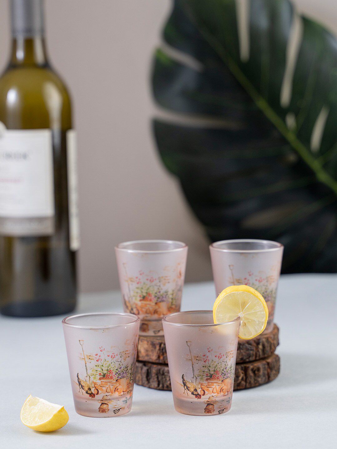 KOLOROBIA Set of 4 Orange & White English Themed Garden Shot Glasses 30 ml Price in India