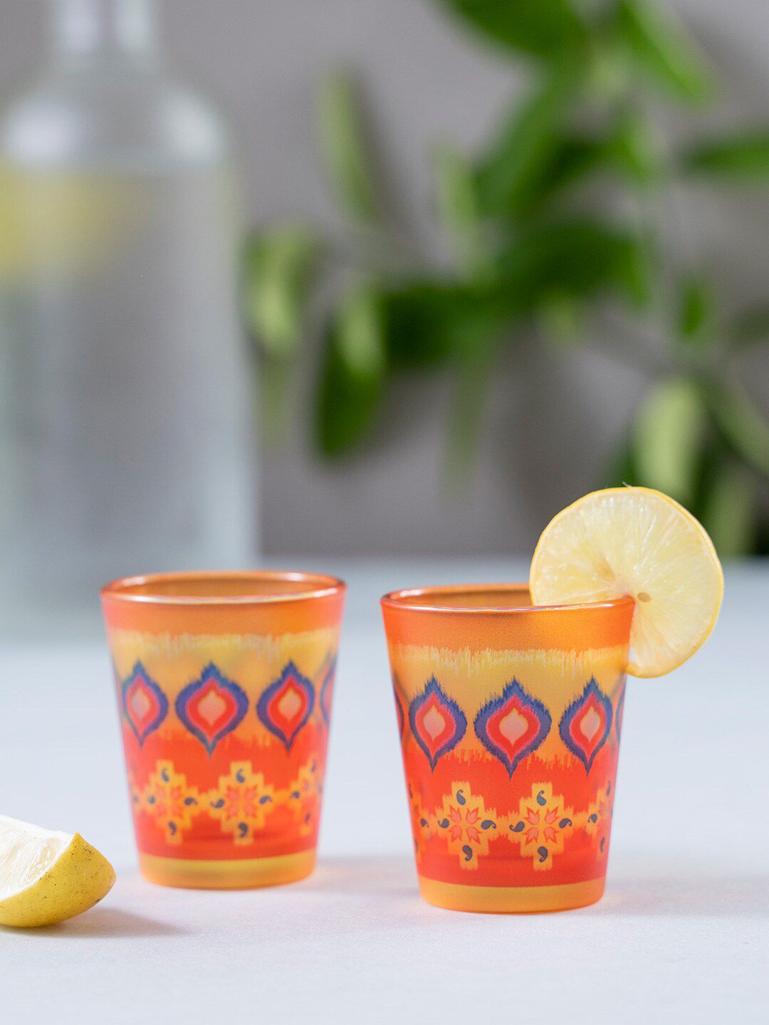KOLOROBIA Set Of 2 Orange & Blue Dazzling Ikat Frosted Shot Glasses Price in India