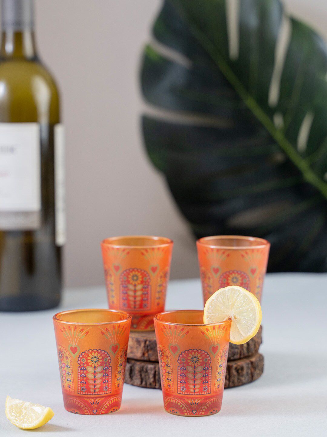 KOLOROBIA Set of 4 Orange Truck Art Jharokha Shot Glasses Price in India