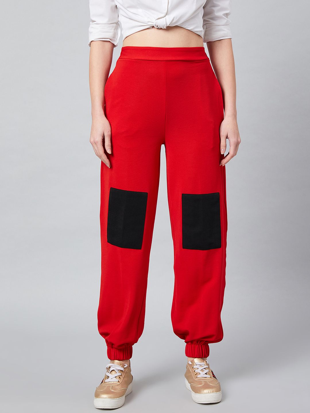 Athena Women Red & Black Loose Fit Solid Joggers Price in India