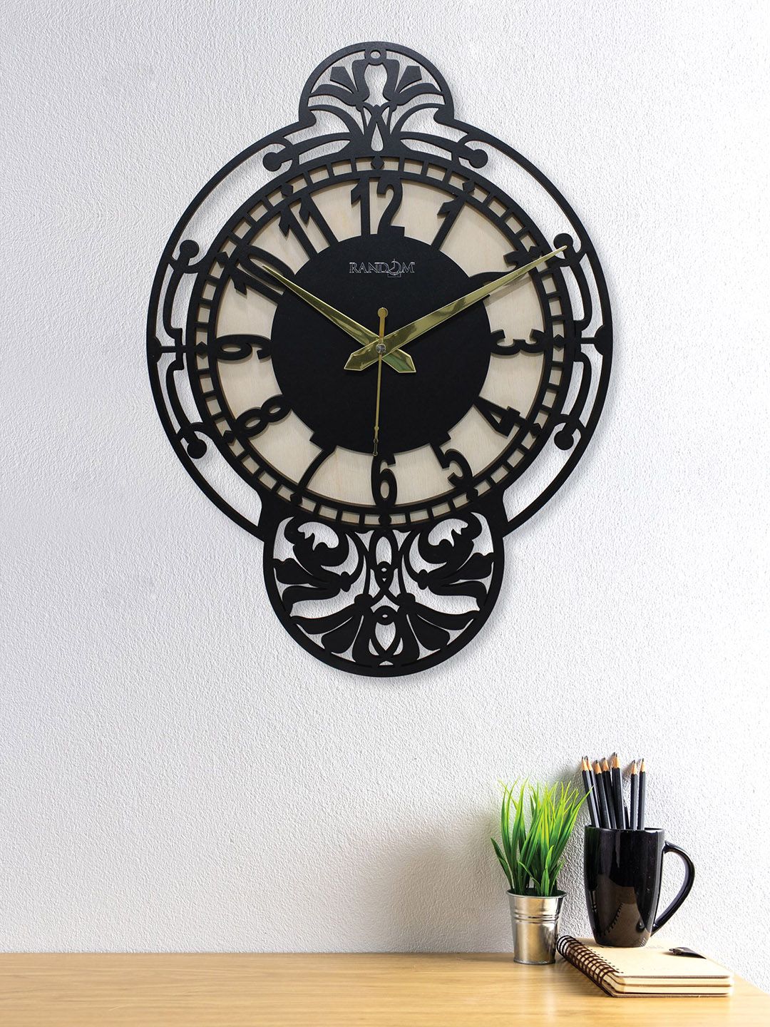 RANDOM Black Oval Textured Analogue Wall Clock Price in India