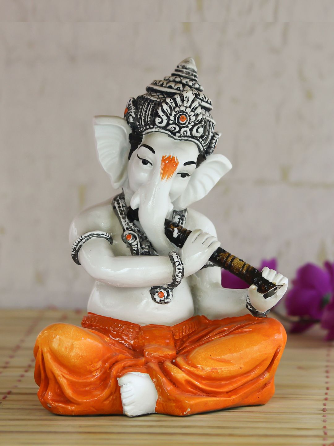 eCraftIndia White & Orange Lord Ganesha Playing Flute Showpiece Price in India