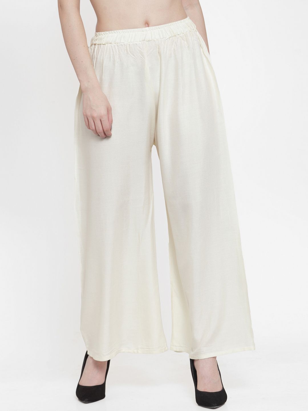 TAG 7 Women Off-White Solid Flared Palazzos Price in India