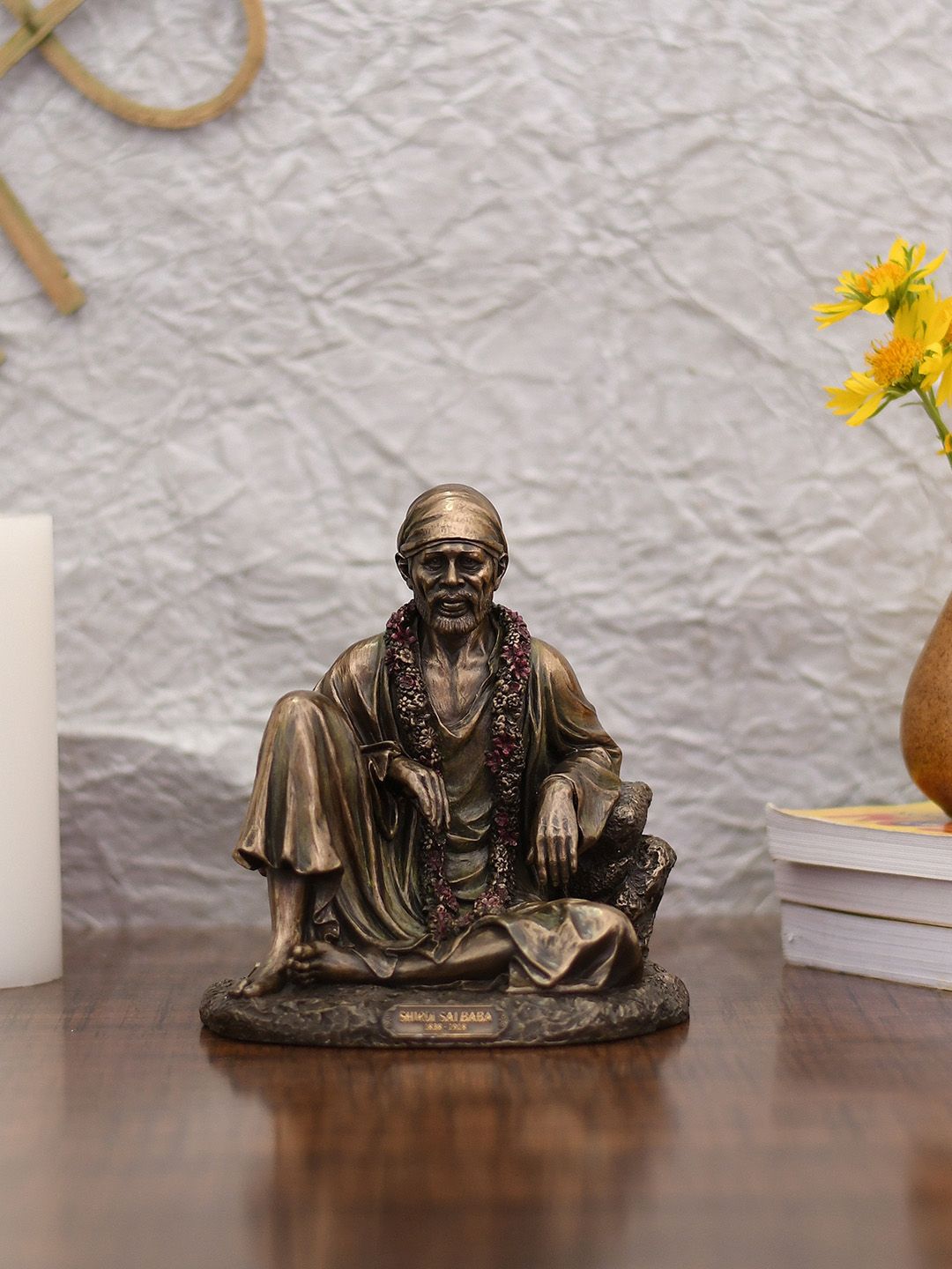 CraftVatika Bronze-Toned Lord Sai Baba Idol Showpiece Price in India