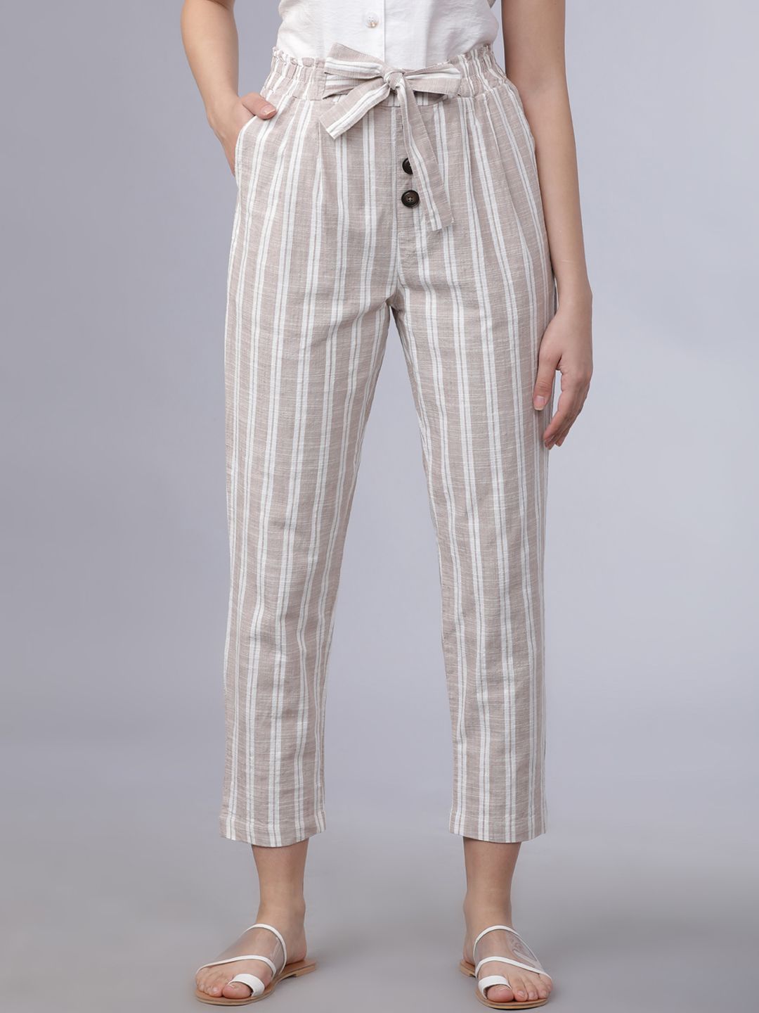 Tokyo Talkies Women Taupe & White Straight Fit Striped Peg Trousers Price in India