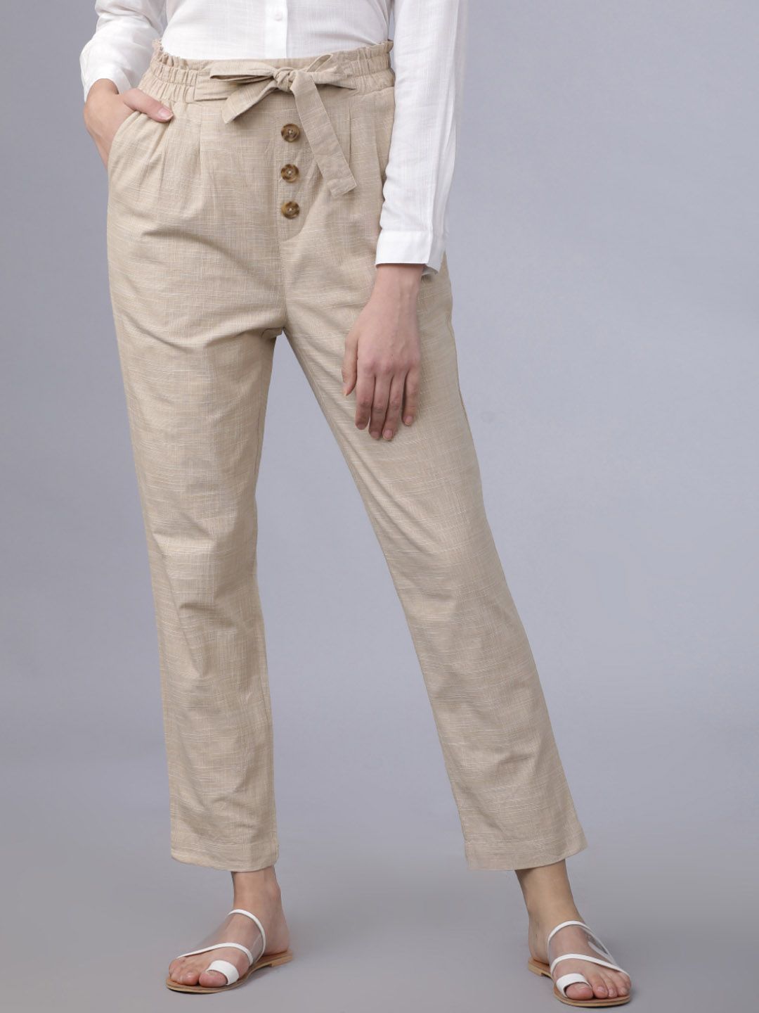 Tokyo Talkies Women Beige Straight Fit Solid Peg Trousers Price in India