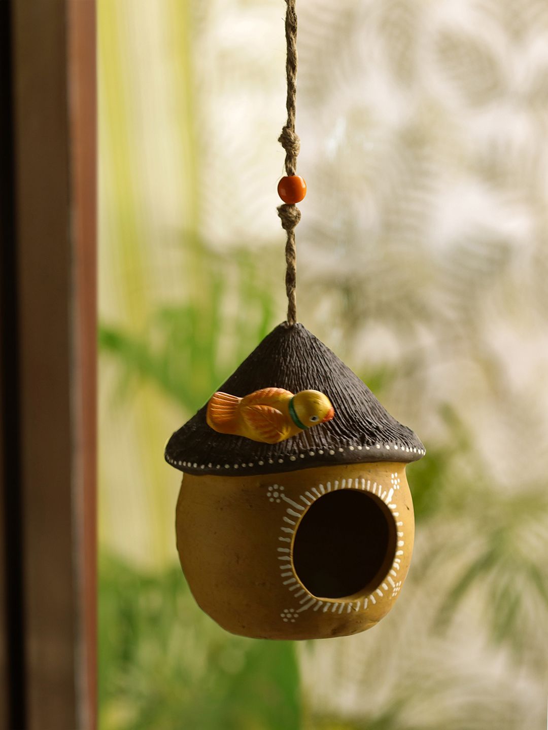 ExclusiveLane Brown & Black Handmade Hand-Painted Terracotta Swinging Cottage Bird House Price in India