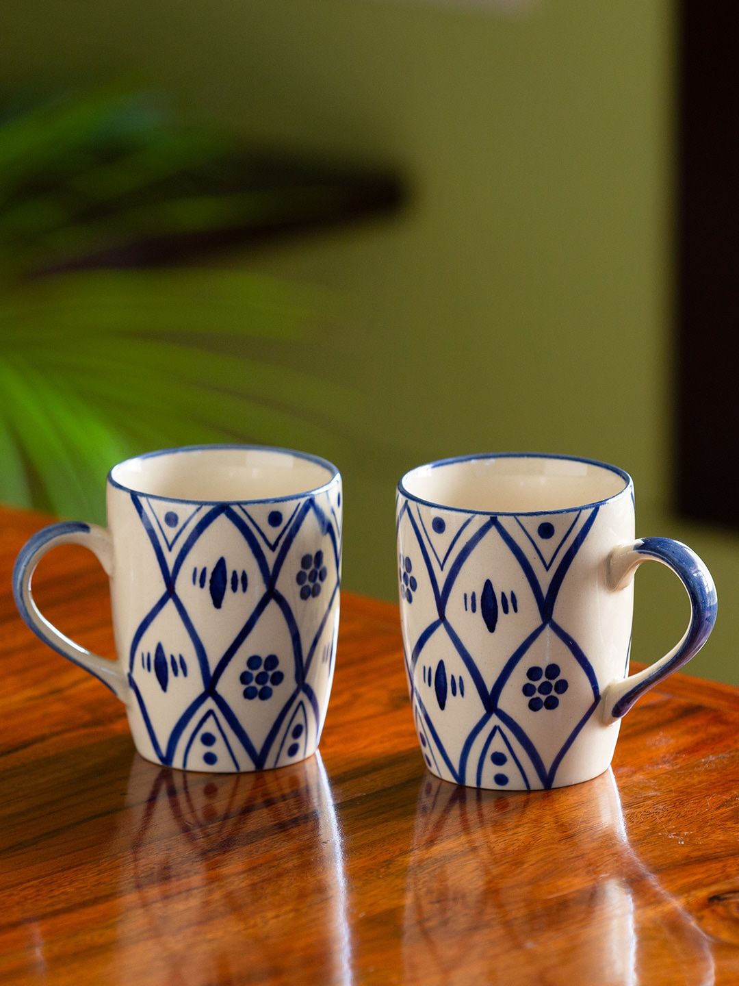 ExclusiveLane 2-Pieces White & Blue Moroccan Hand-Painted Ceramic Microwave Safe Mugs Set Price in India