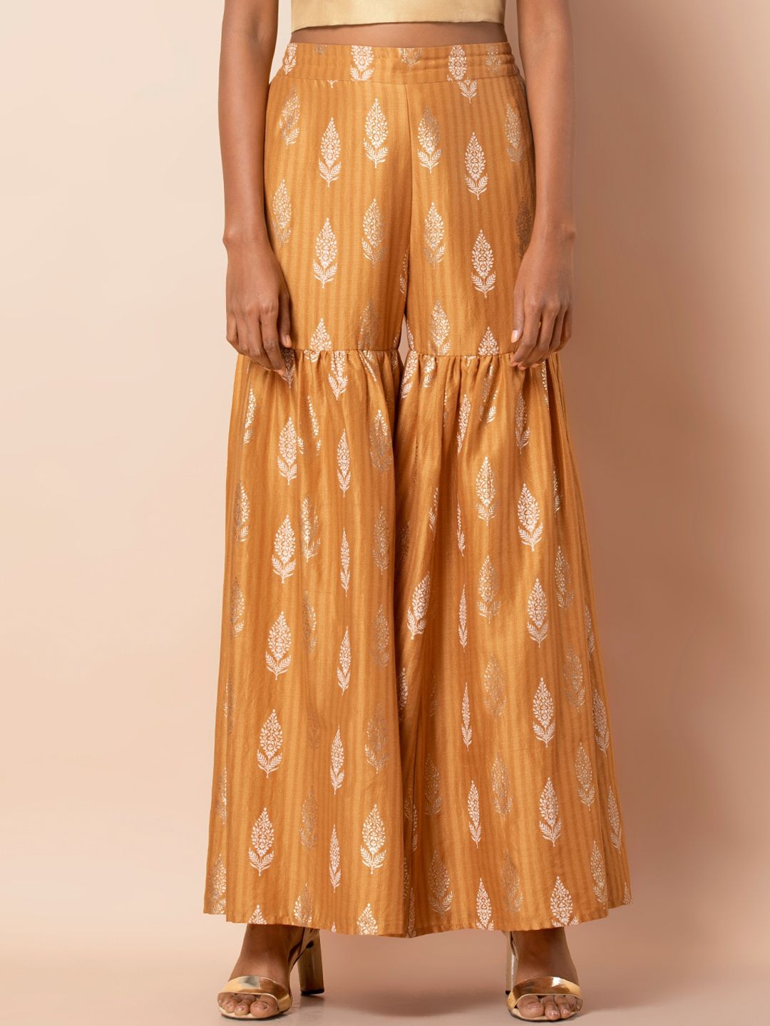 INDYA Women Yellow & Beige Printed Flared Palazzos Price in India