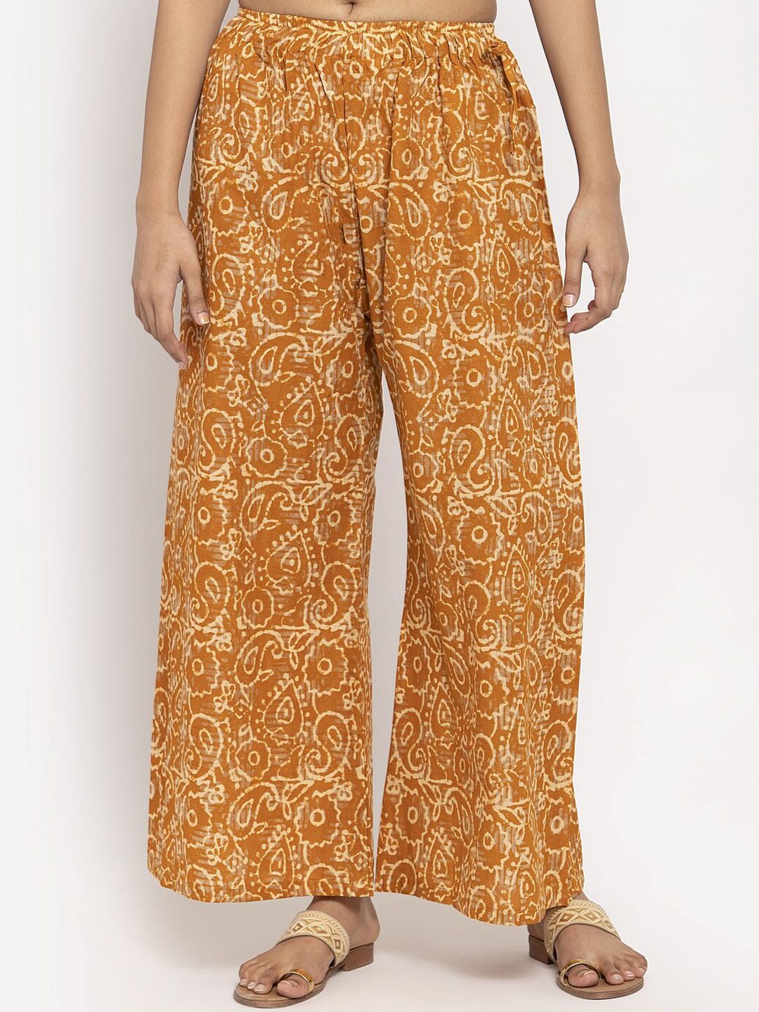 TAG 7 Women Orange Batik Printed Flared Palazzos Price in India
