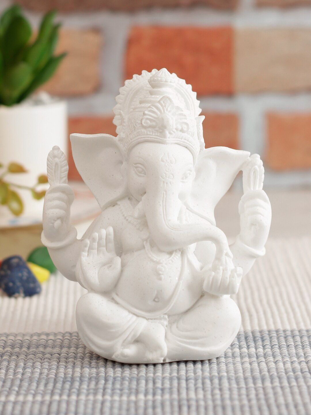 TAYHAA White Solid Lord Ganesha Polyresin Showpiece Price in India