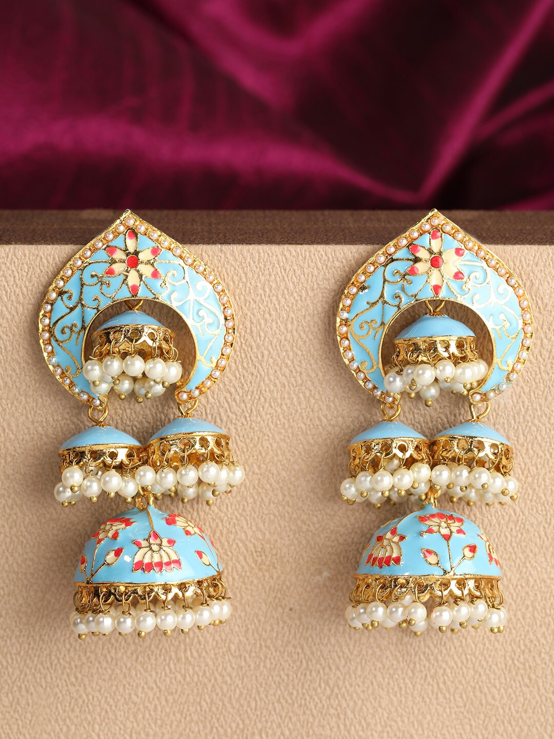 ANIKAS CREATION Blue & Gold-Plated Dome Shaped Pearl Jhumkas Price in India