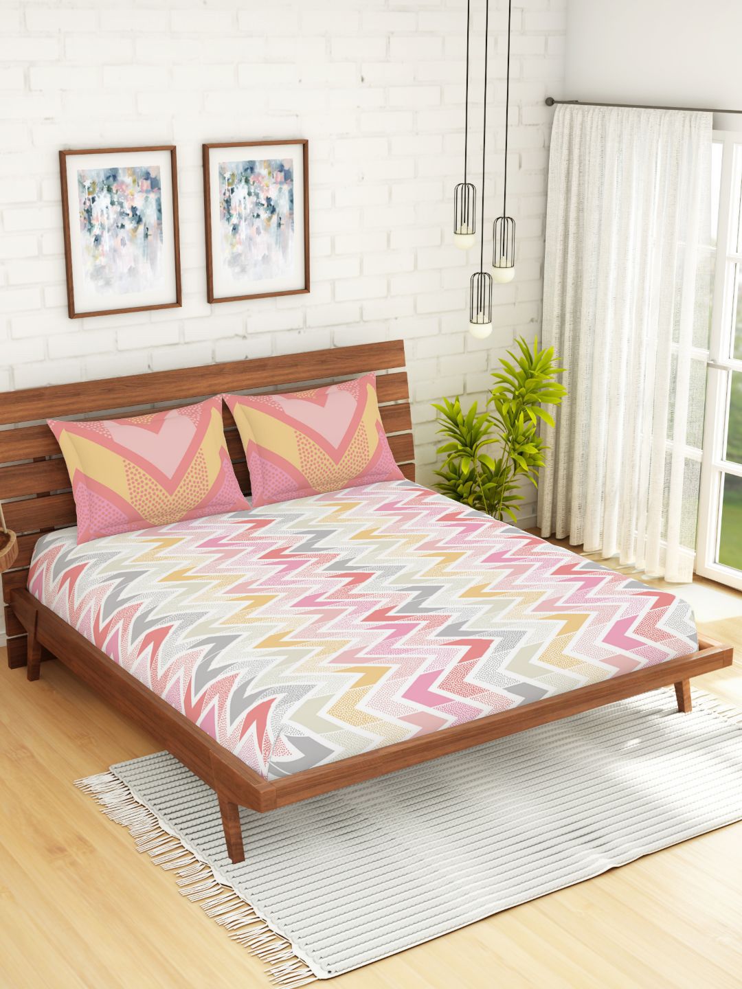 SPACES Orange & White Geometric 144 TC Cotton 1 Queen Bedsheet with 2 Pillow Covers Price in India
