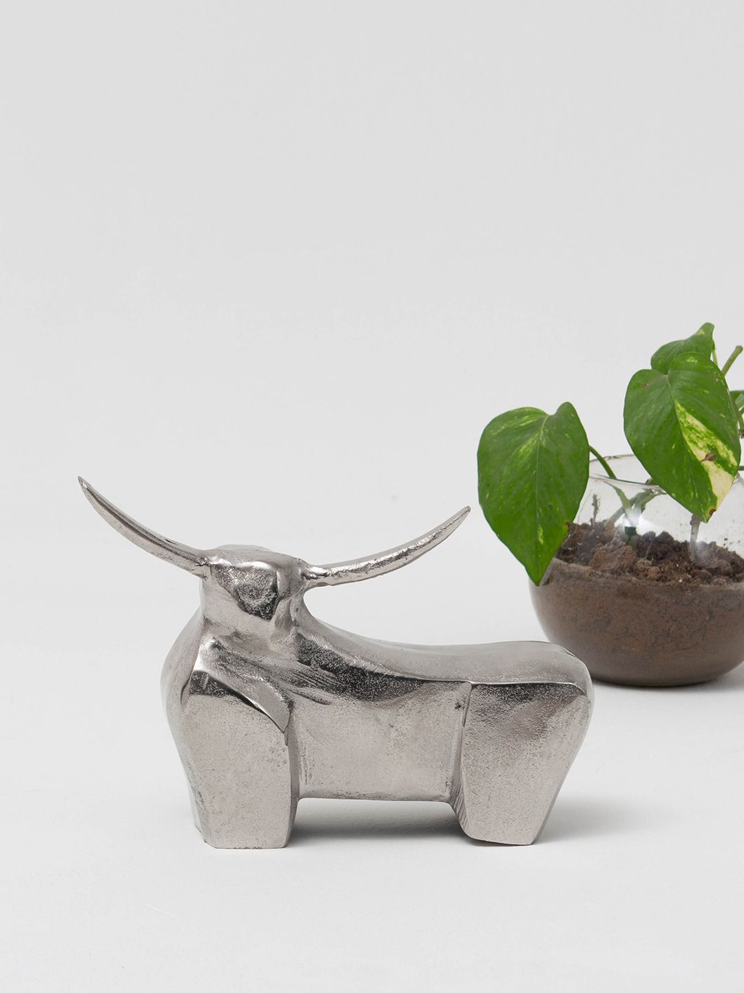 CASA DECOR Silver-Toned Textured Aluminium Handcrafted Sustainable Bull-Shaped Showpiece Price in India