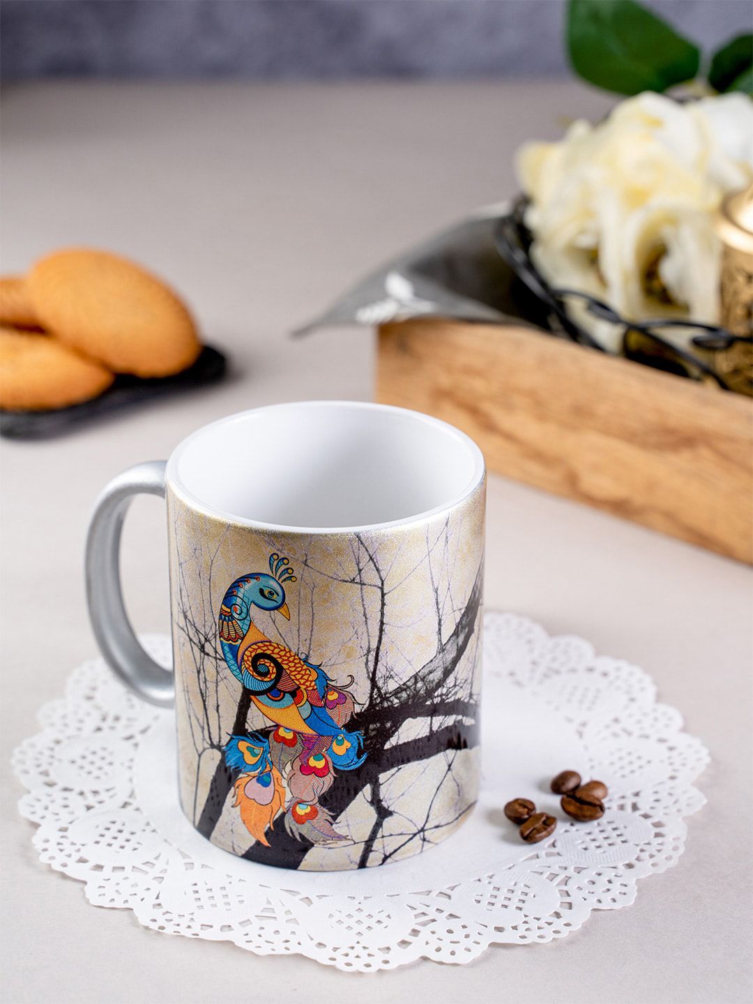 KOLOROBIA Gold-Toned & Blue Printed Charismatic Peacock Ceramic Mug Price in India