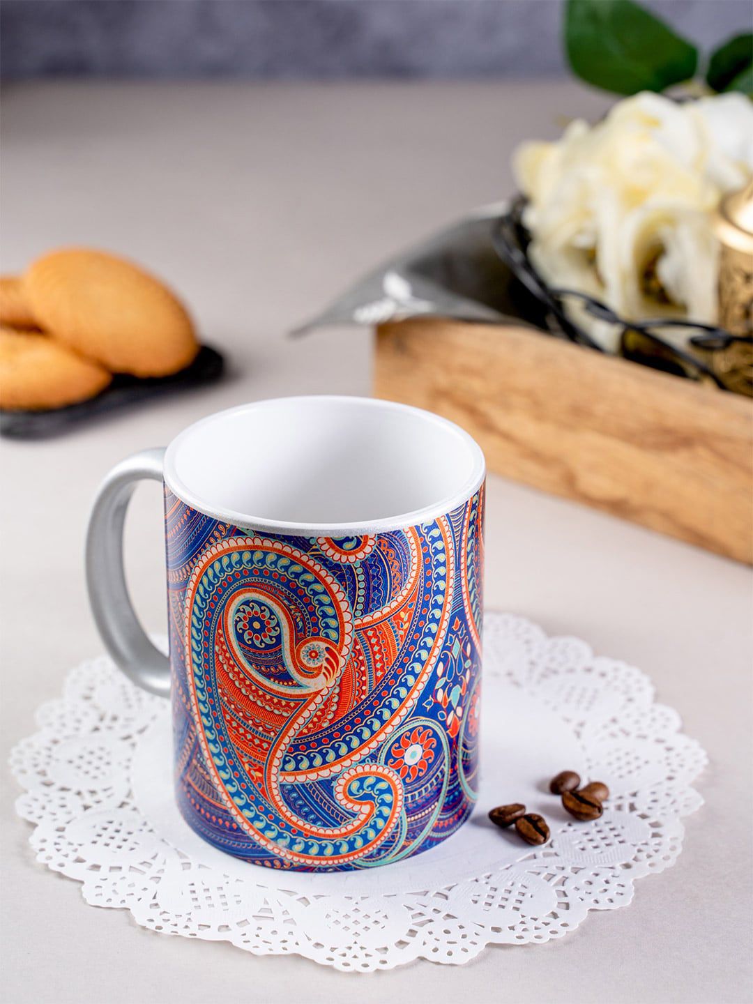 KOLOROBIA Silver-Toned & Blue Printed Splendid Paiseley Ceramic Mug Price in India