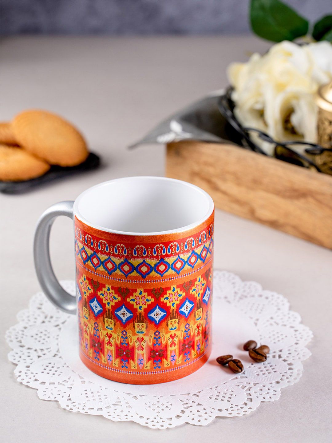 KOLOROBIA Orange & Blue Dazzling Ikat Printed Ceramic Mug Price in India